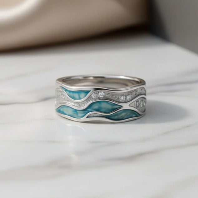 Anillo de plata con diseño de olas turquesas