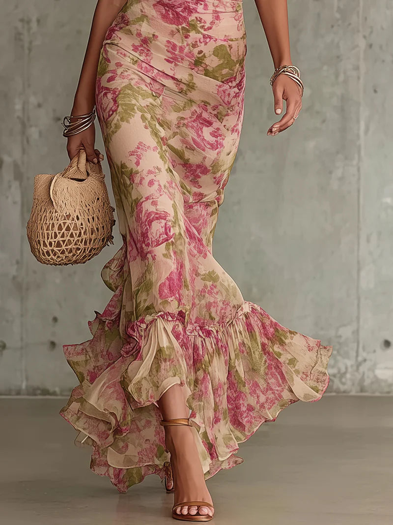 Vestido largo con estampado de rosas vintage y mangas abullonadas.