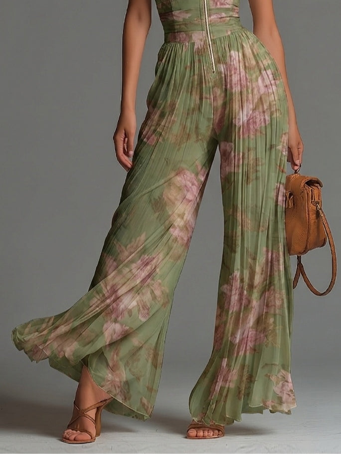 Mono de gasa verde sin mangas con estampado floral y cremallera.