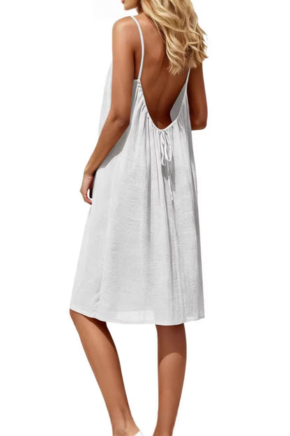 Vestido mini de seda en colores lisos, con fruncidos y espalda descubierta