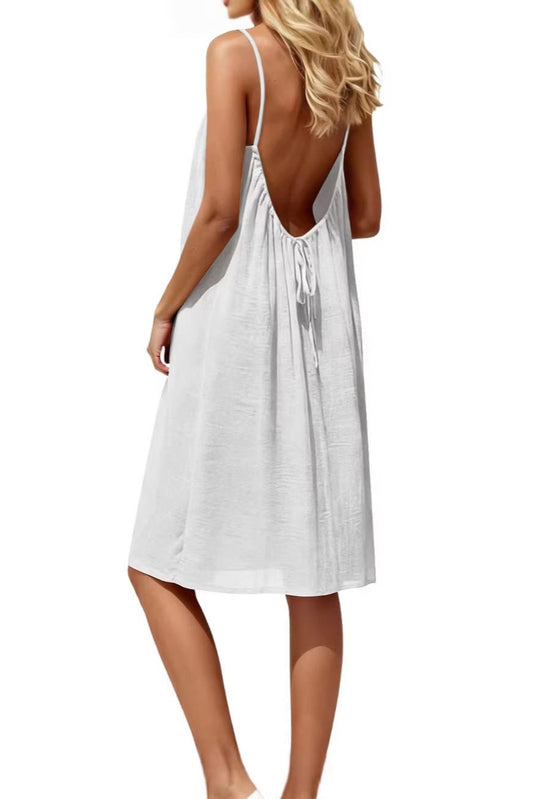 Vestido mini de seda en colores lisos, con fruncidos y espalda descubierta