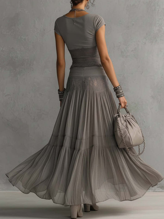Conjunto de top de encaje gris y falda larga plisada