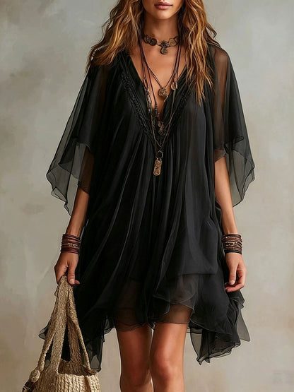 Vestido mini fluido en capas con escote en V