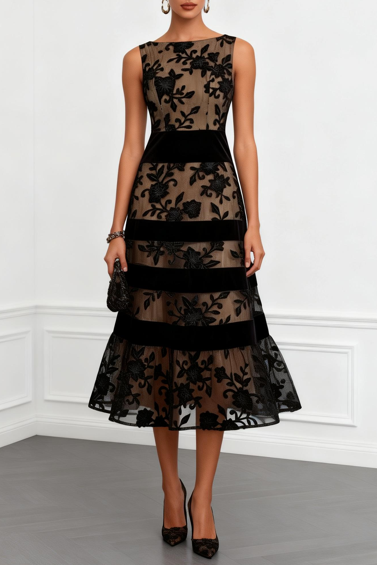 Vestido midi negro de malla sin mangas con corte en A y estampado floral.