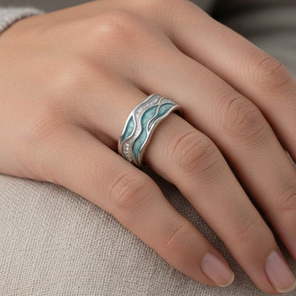 Anillo de plata con diseño de olas turquesas