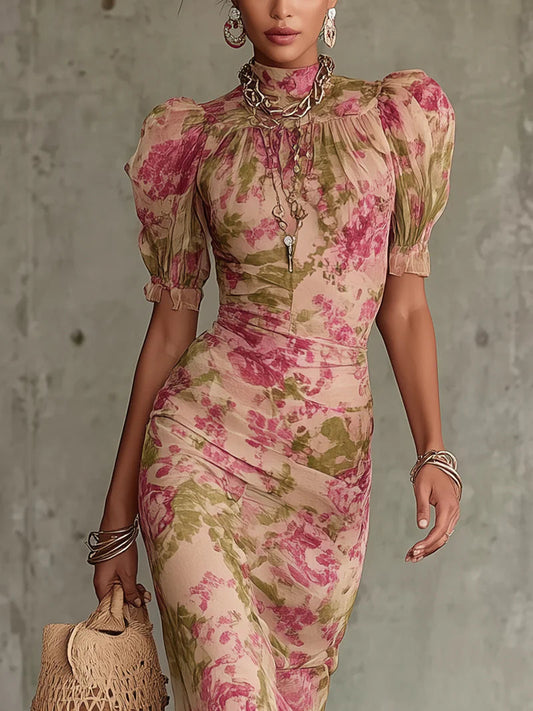 Vestido largo con estampado de rosas vintage y mangas abullonadas.