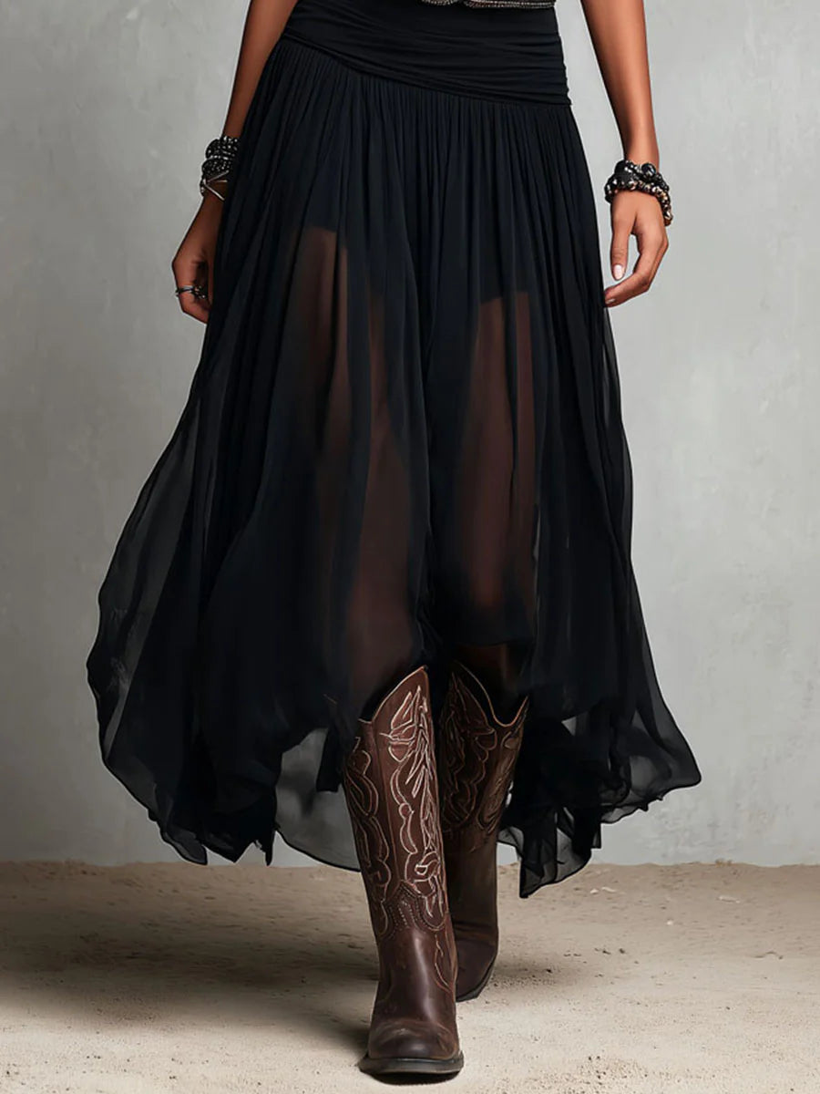 Conjunto de top negro y falda larga de tul