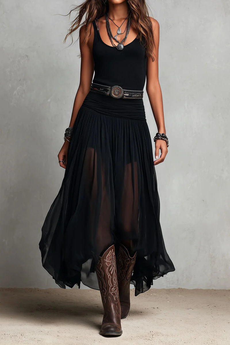 Conjunto de top negro y falda larga de tul