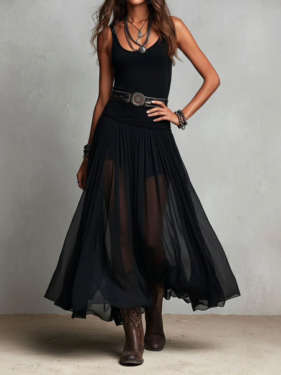 Conjunto de top negro y falda larga de tul