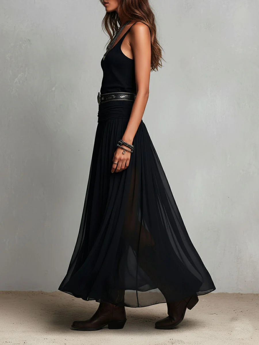 Conjunto de top negro y falda larga de tul