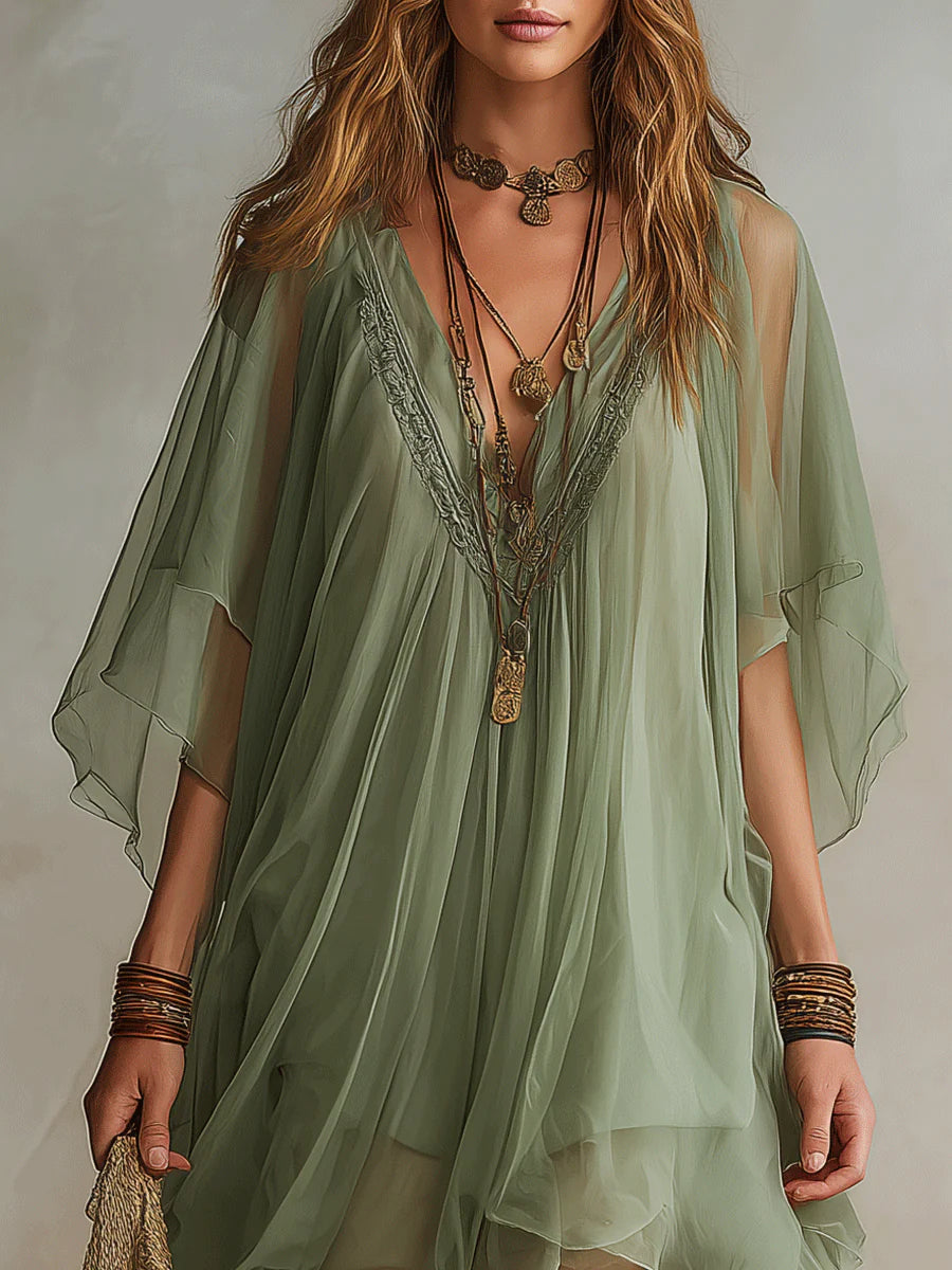 Vestido mini fluido en capas con escote en V