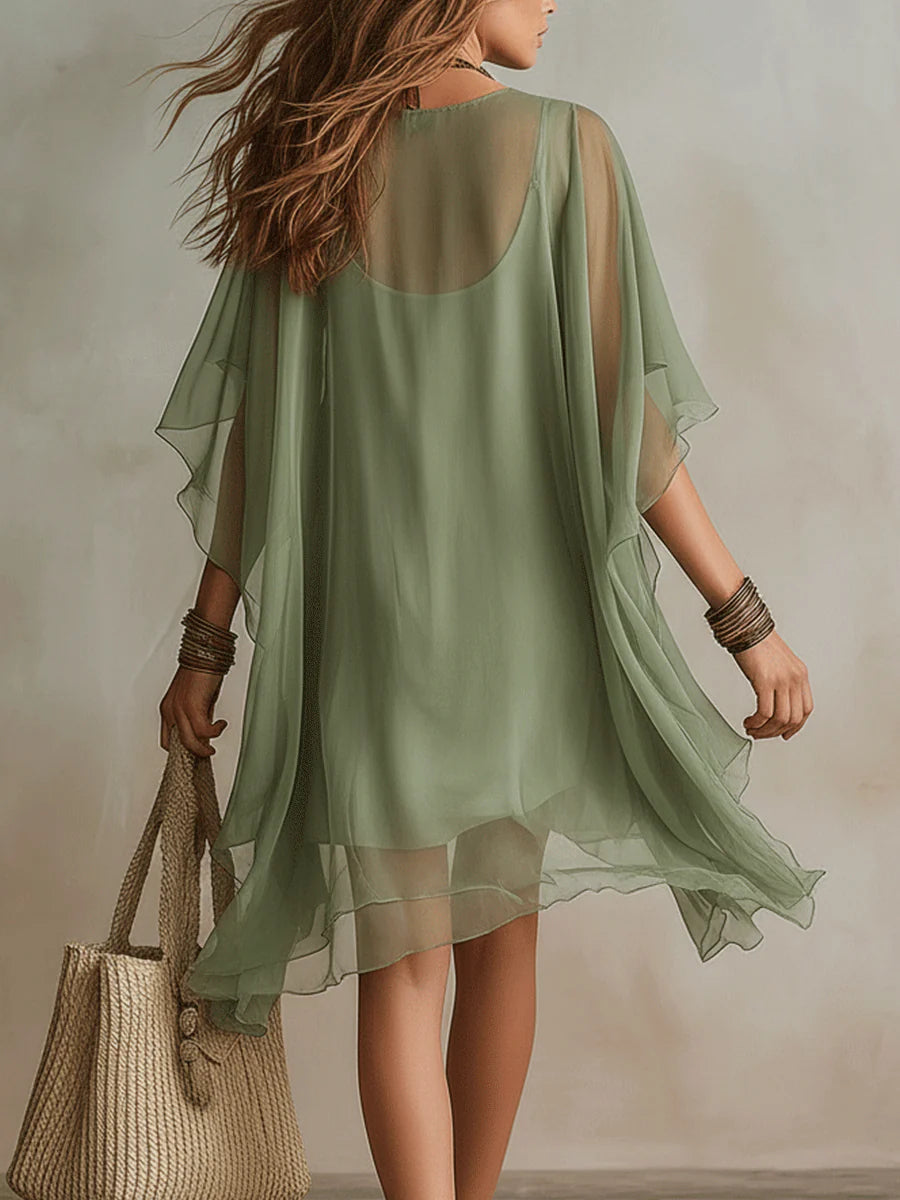 Vestido mini fluido en capas con escote en V
