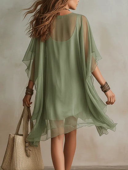 Vestido mini fluido en capas con escote en V