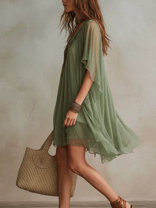 Vestido mini fluido en capas con escote en V