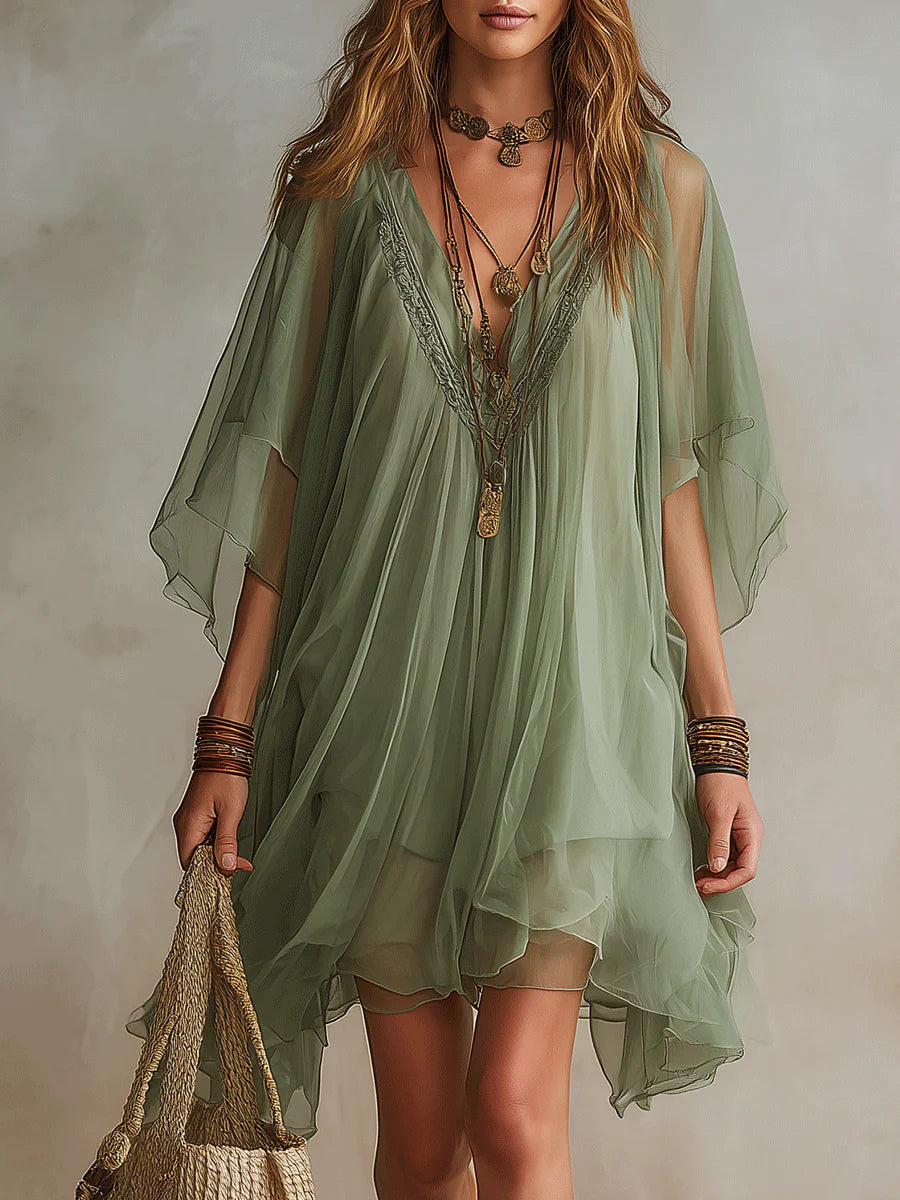 Vestido mini fluido en capas con escote en V