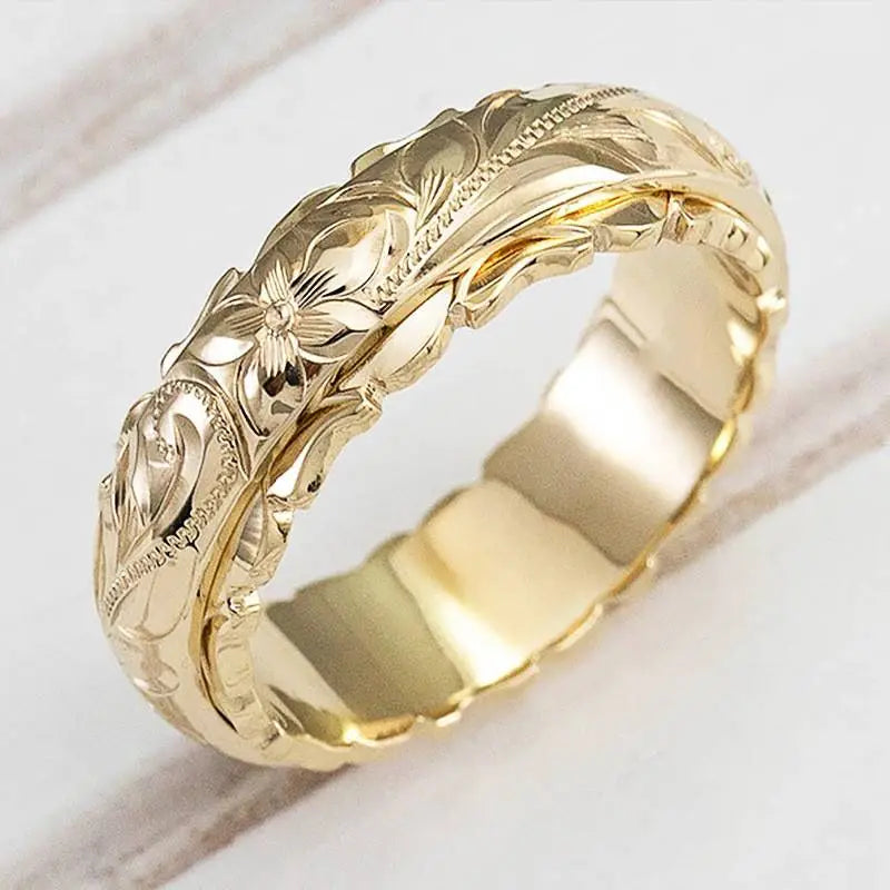 Anillo de oro “Flor antigua”