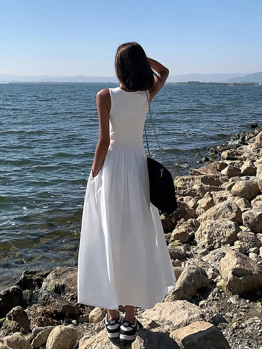 Vestido Elegance – Corte Entallado y Falda Fluida